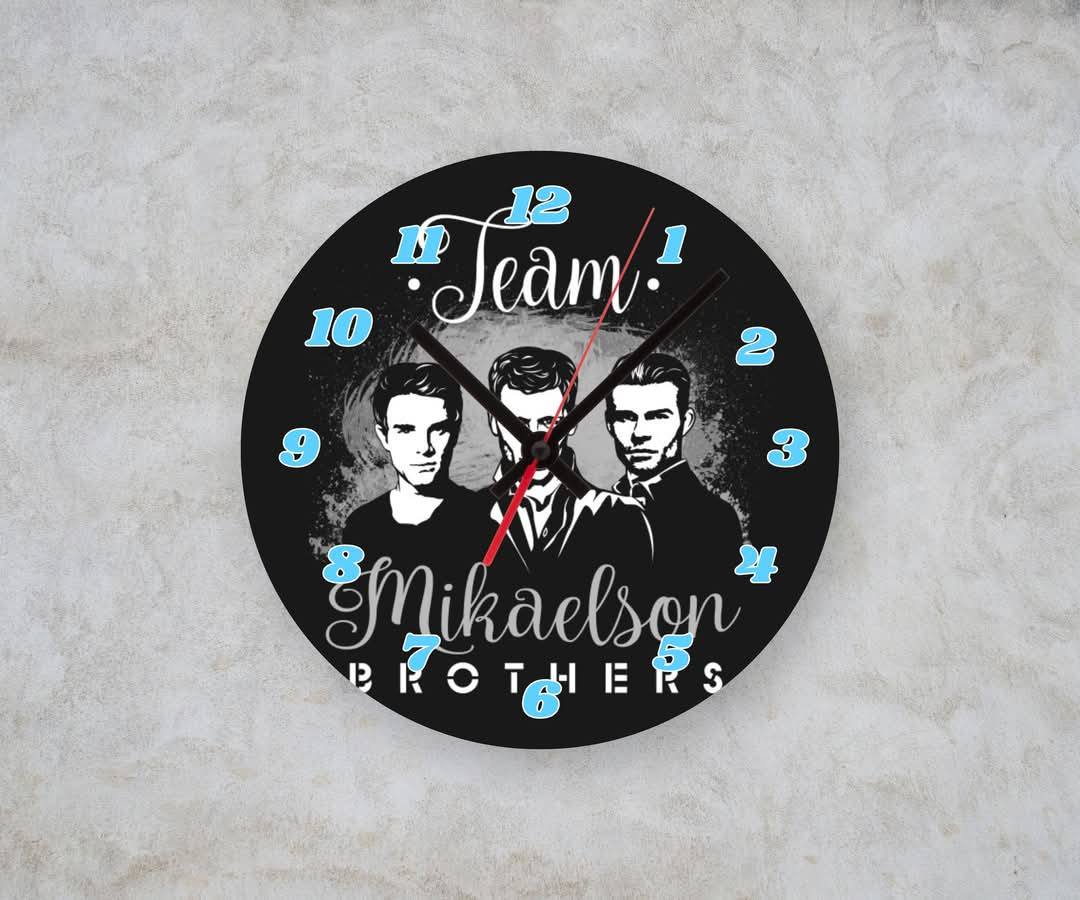 TEAM MIKAELSON β Custom Framed Clock (10β Round)